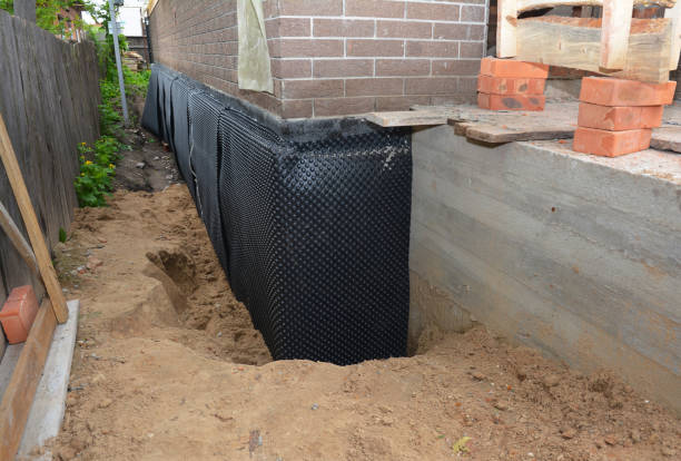 Happy homeowners after waterproofing job in Hoagland